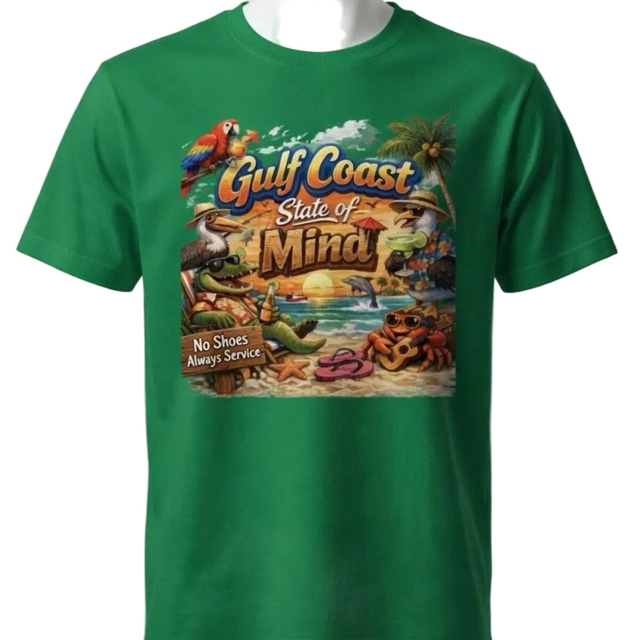 A green short-sleeve crewneck t-shirt displayed on a white mannequin torso against a light gray background. The shirt features a large, colorful graphic print on the front with the text 'Gulf Coast State of Mind' and a tropical beach scene.